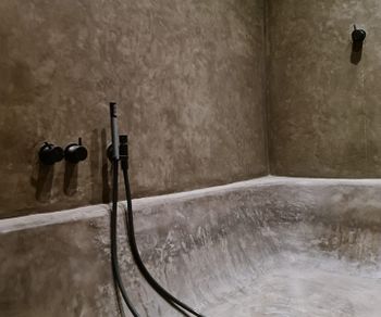 complete bath and shower in stucco
